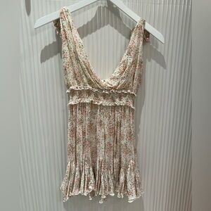 This is a Skylar + Madison cream and colorful dots dress.